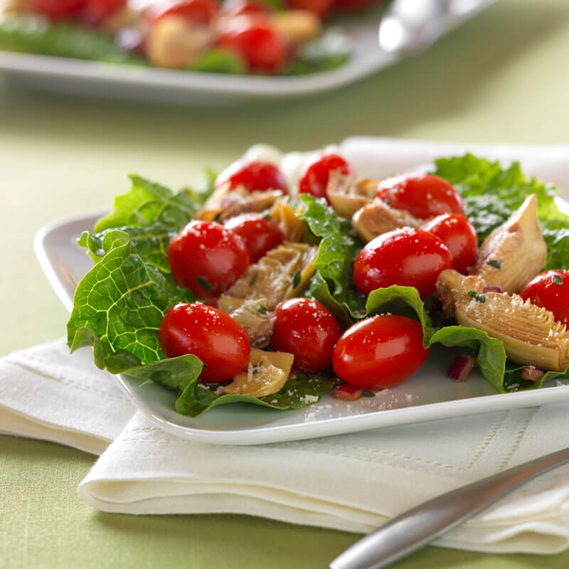 Ensalada de Tomates NatureSweet® Cherubs® y Alcachofas